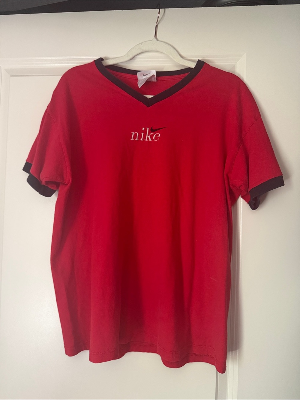 Nike Woman’s Red V-Neck Tee with Black Trim